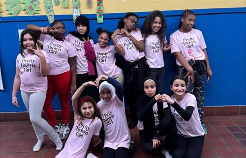 students posing in pretty brown girl t-shirts